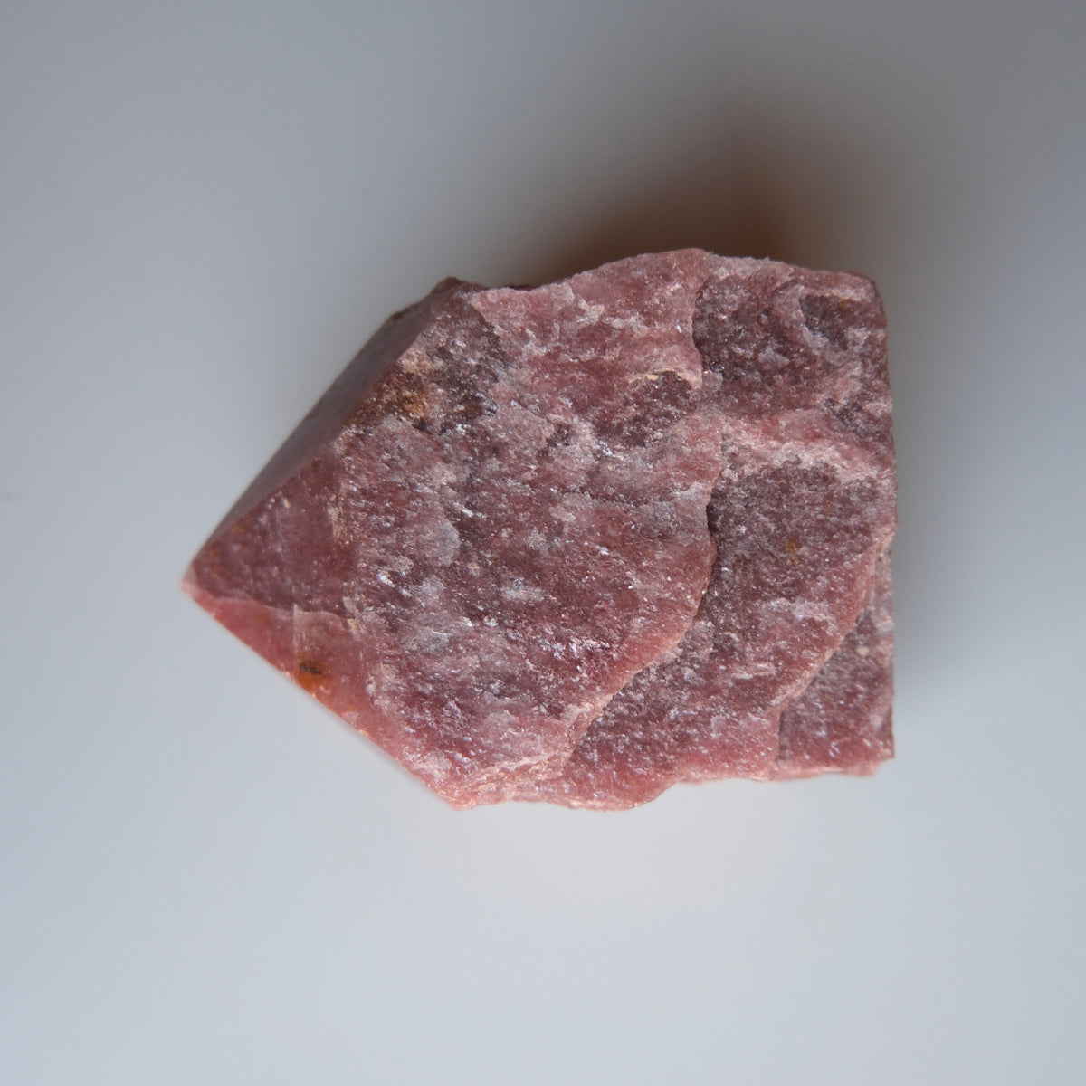 Red Fuschite Half Raw Point