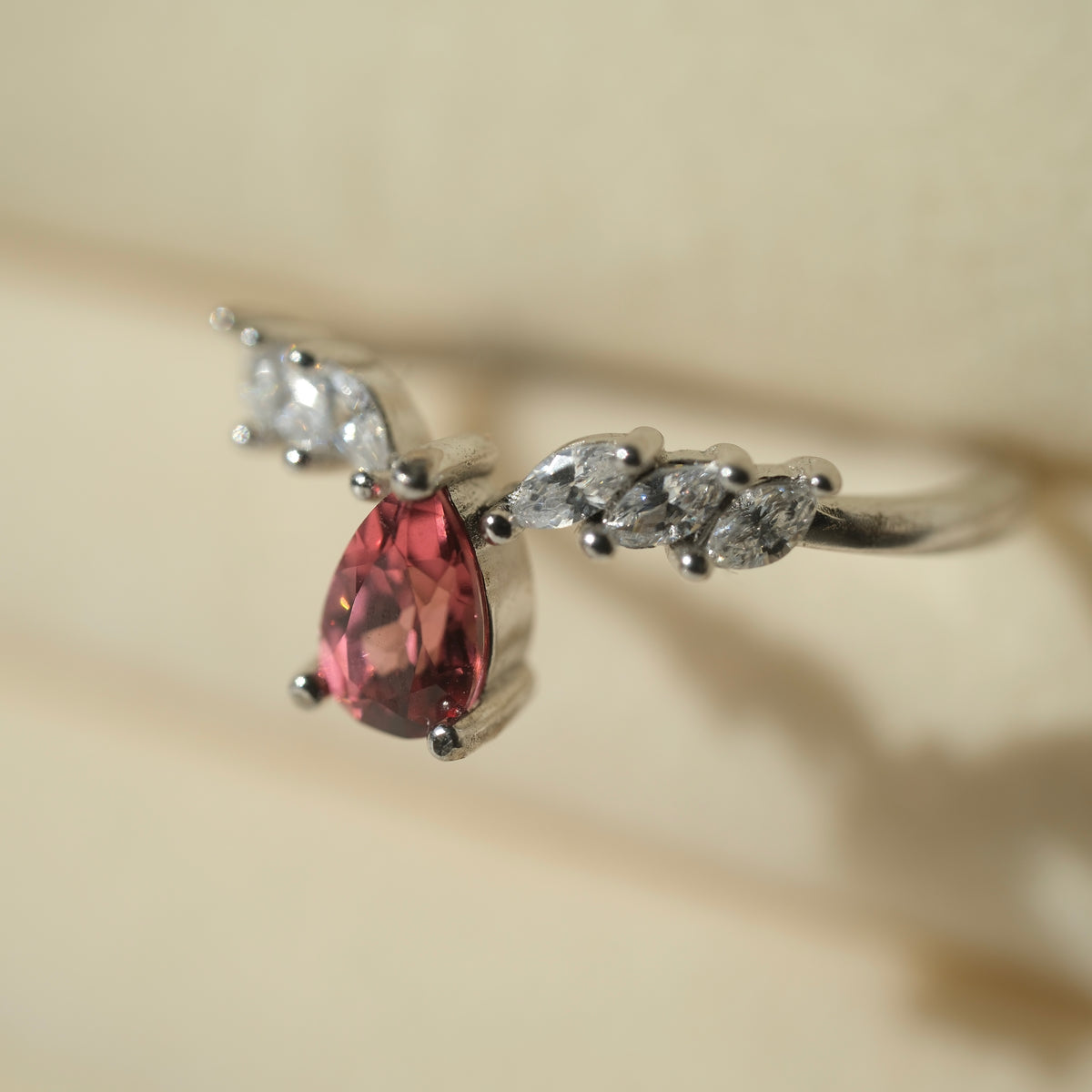 Garnet S925 teardrop ring, angled side view