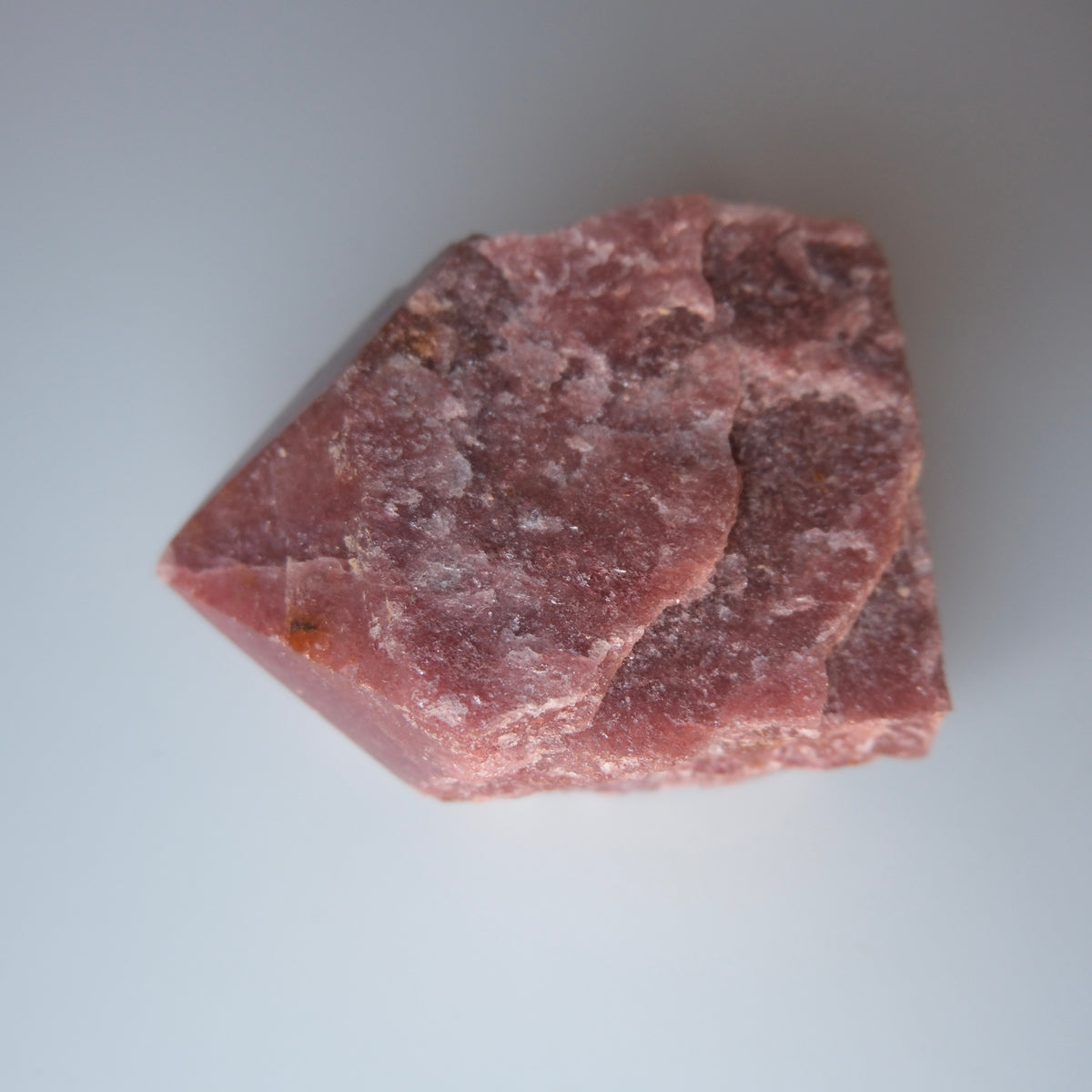 Red Fuschite Half Raw Point