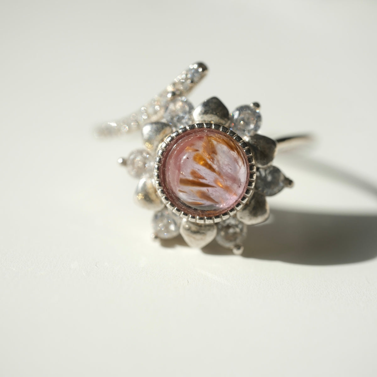 Auralite 23 S925 adjustable flower ring with pink cabochon and amber inclusions
