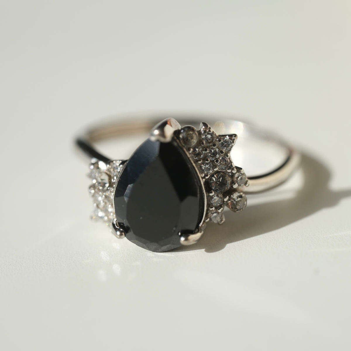 Black Spinel teardrop S925 adjustable ring with clear stone and star accents