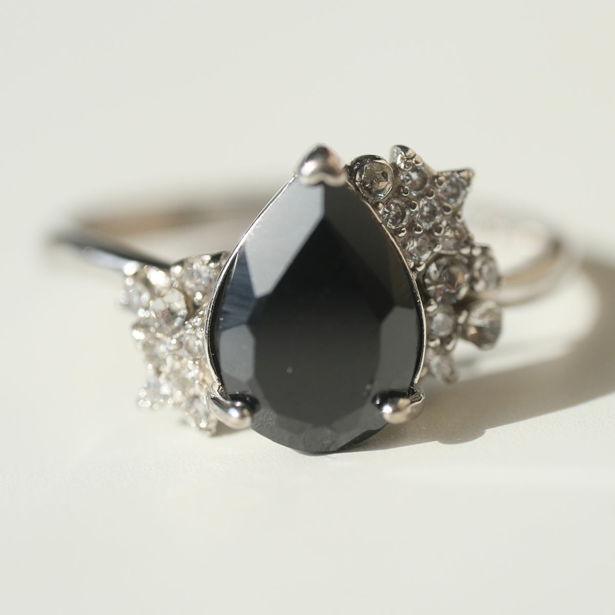 Black Spinel teardrop S925 adjustable ring with clear stone and star accents