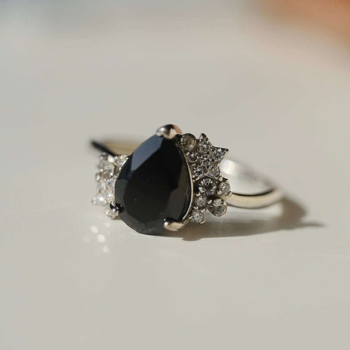 Black Spinel teardrop S925 adjustable ring with clear stone and star accents