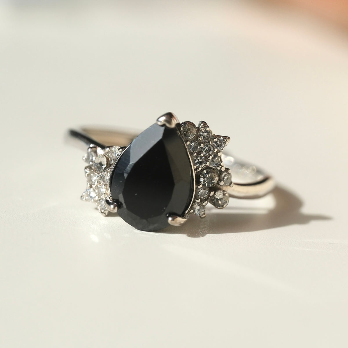 Black Spinel teardrop S925 adjustable ring with clear stone and star accents