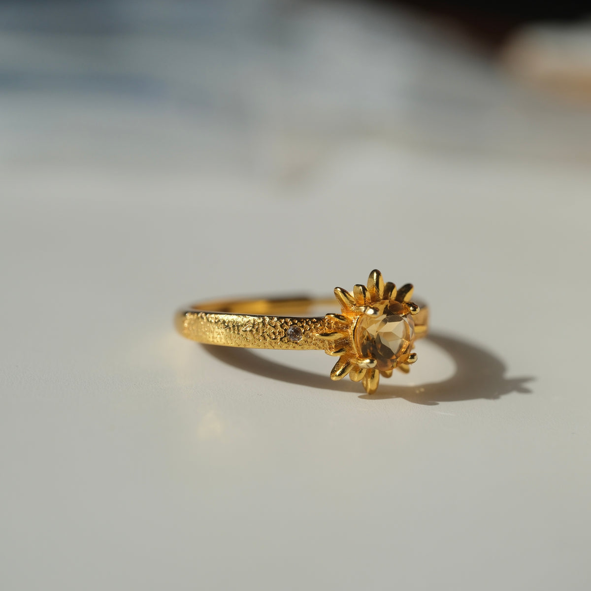 Citrine Sun S925 adjustable ring with a faceted golden centre stone, sunray setting and textured gold-coloured band