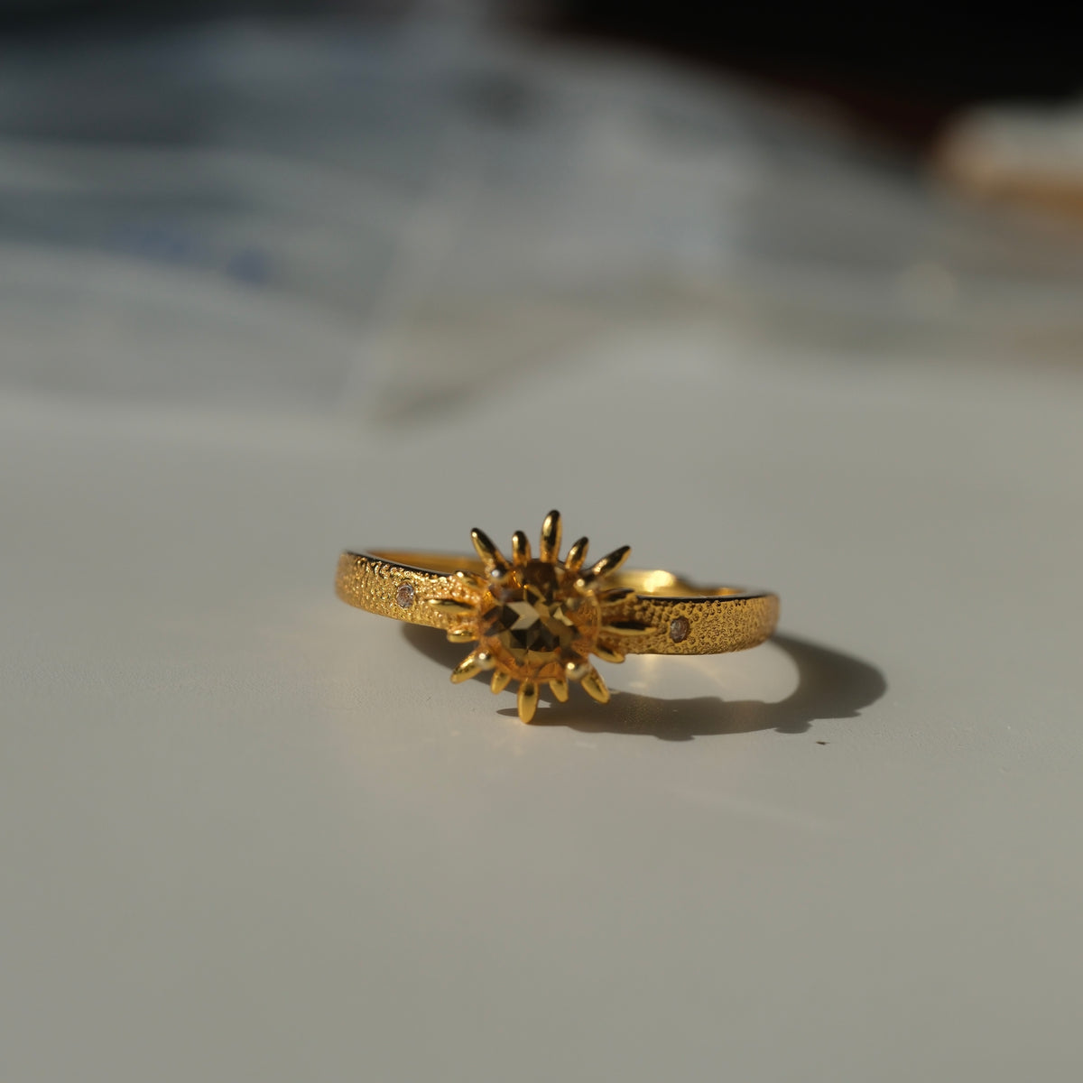 Citrine Sun S925 adjustable ring with a faceted golden centre stone, sunray setting and textured gold-coloured band