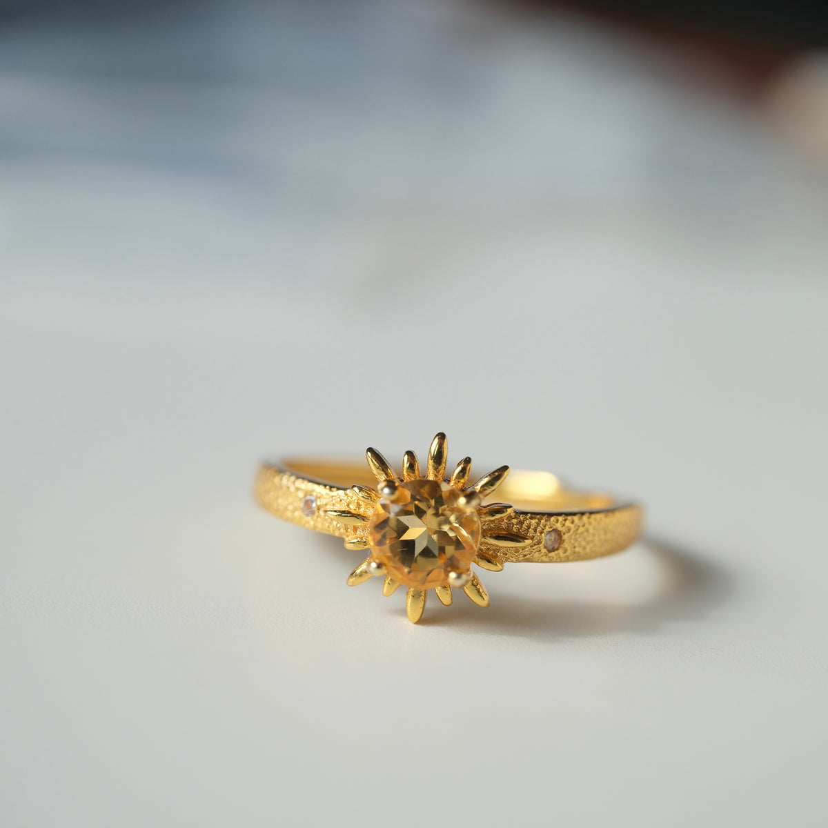Citrine Sun S925 adjustable ring with a faceted golden centre stone, sunray setting and textured gold-coloured band