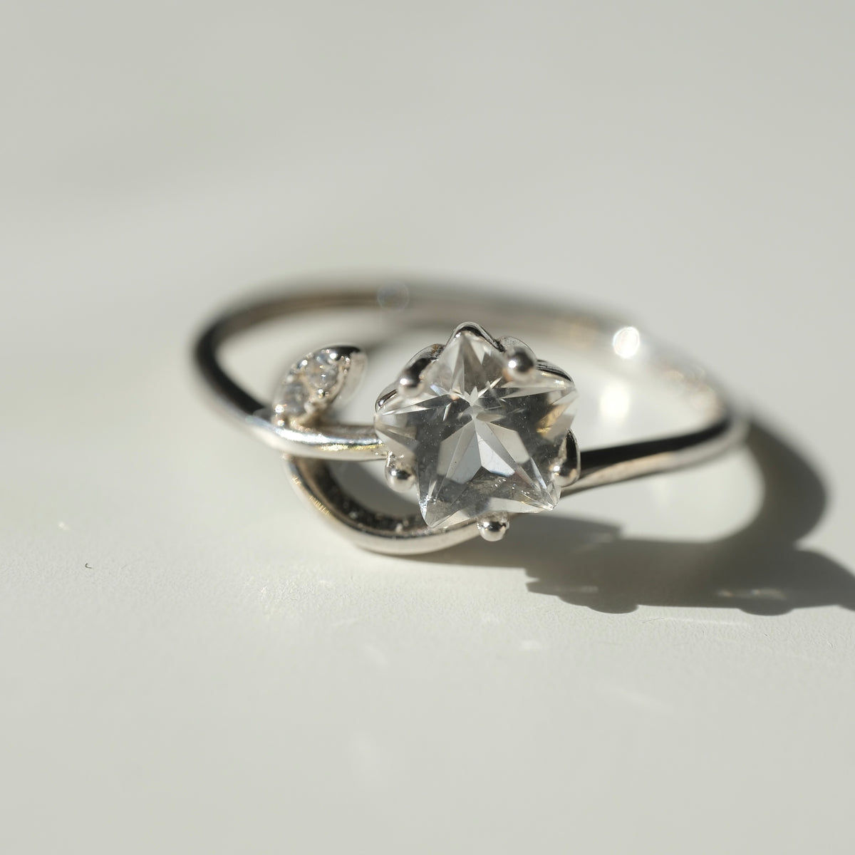 Clear Quartz star S925 adjustable silver ring with sparkling accent
