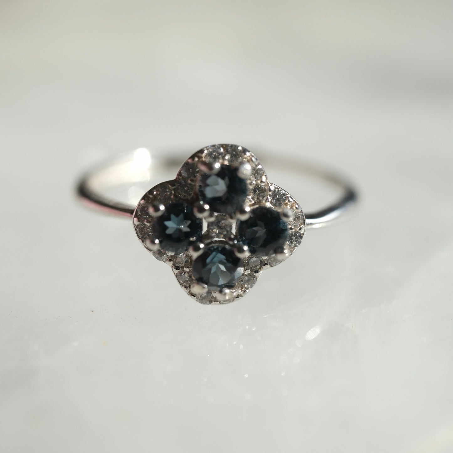 London Blue Topaz S925 adjustable ring with floral cluster design