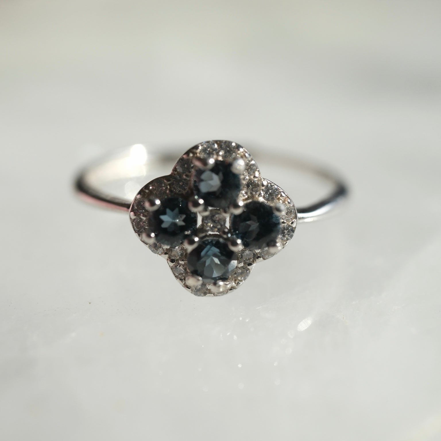 London Blue Topaz S925 adjustable ring with floral cluster design