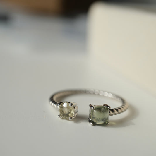 Moldavite and Libyan Desert Glass S925 adjustable ring with two stones in an open setting and a twisted silver band