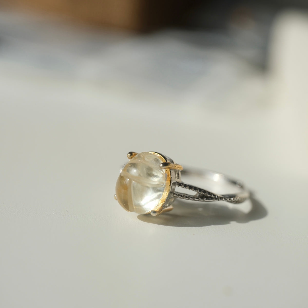 Scarab ring split shoulder and gold-tone setting