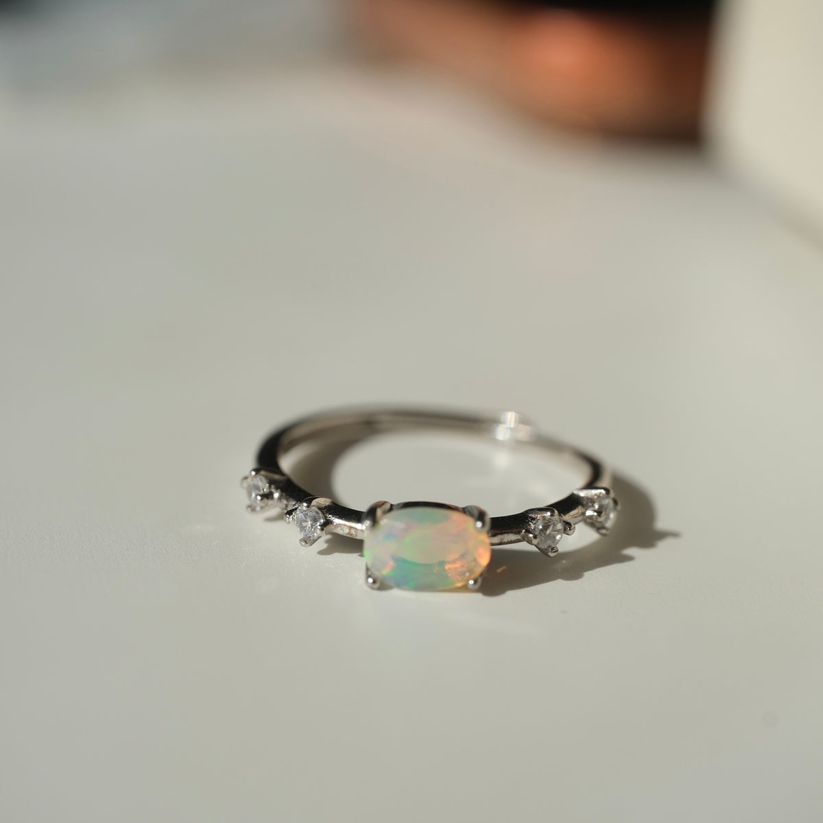 White Opal S925 adjustable ring, oval opal and clear accent stones, view 2