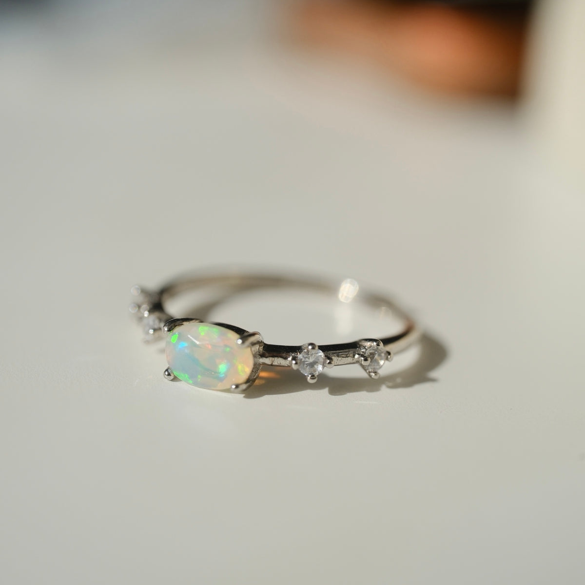 White Opal S925 adjustable ring, oval opal and clear accent stones, view 4