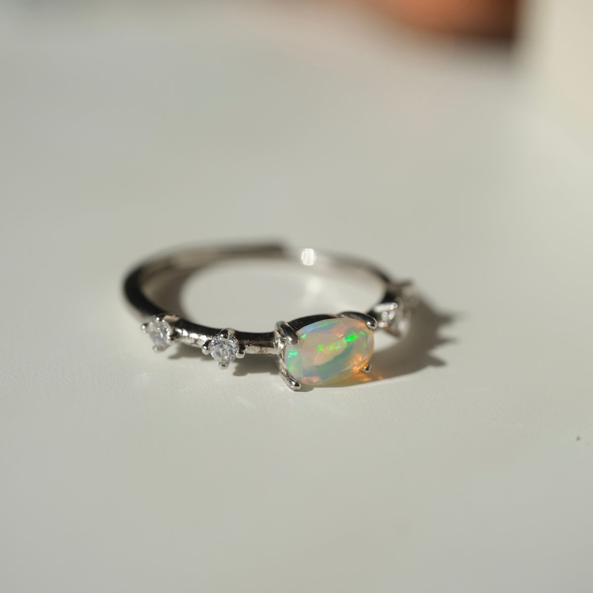White Opal S925 adjustable ring, oval opal and clear accent stones, view 5
