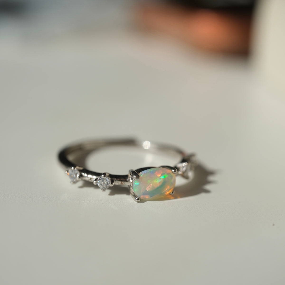 White Opal S925 adjustable ring, oval opal and clear accent stones, view 6